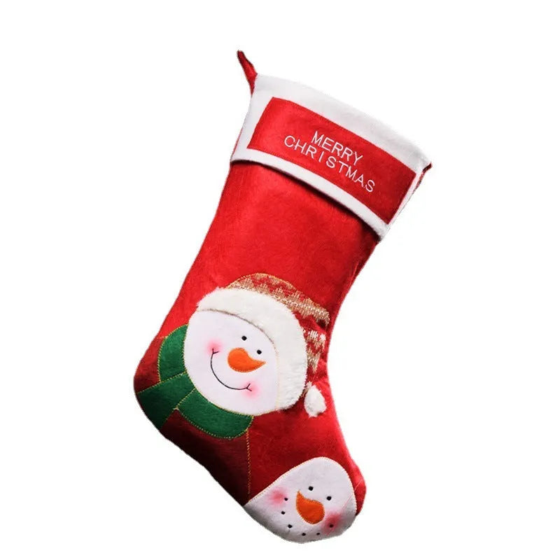Red Christmas stocking with elk and snowman pattern, made from non-woven fabric with hanging loop.