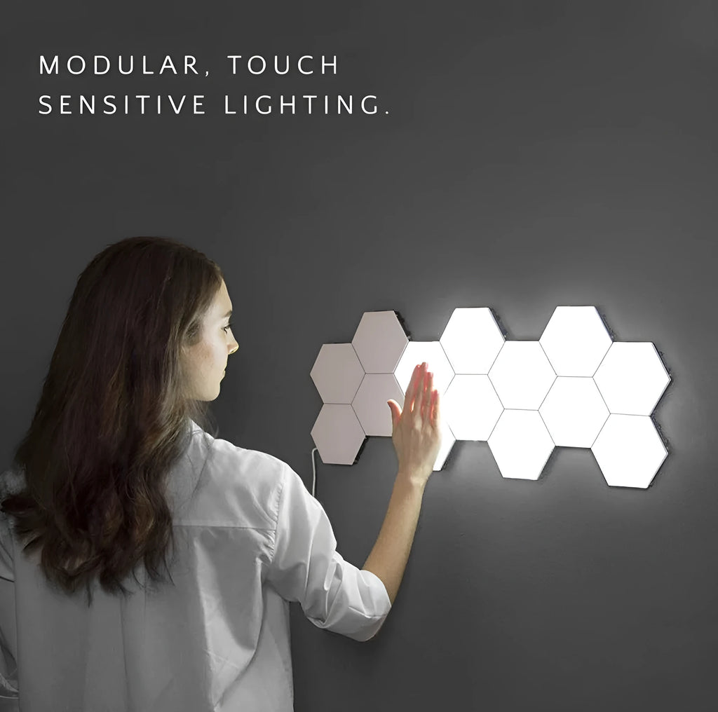 Helios modular touch wall lamp with honeycomb design showing UK plug and LED illumination