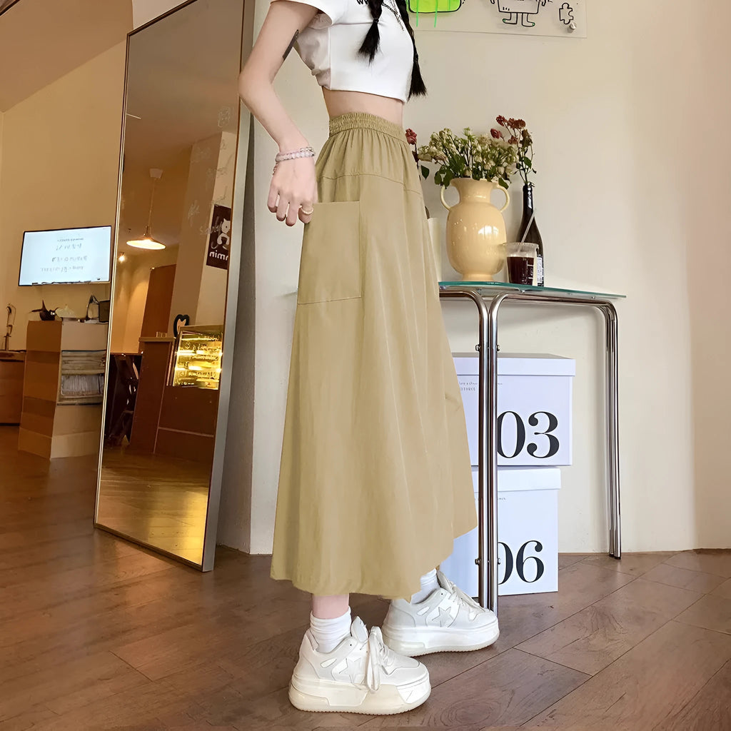 Camel coloured women's wide leg skirt with elastic waist and drape detail