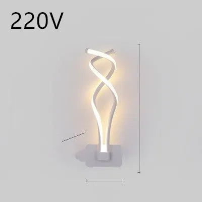 Minimalist Nordic design LED wall lamp with a silicone shade, mounted on a bedroom wall.