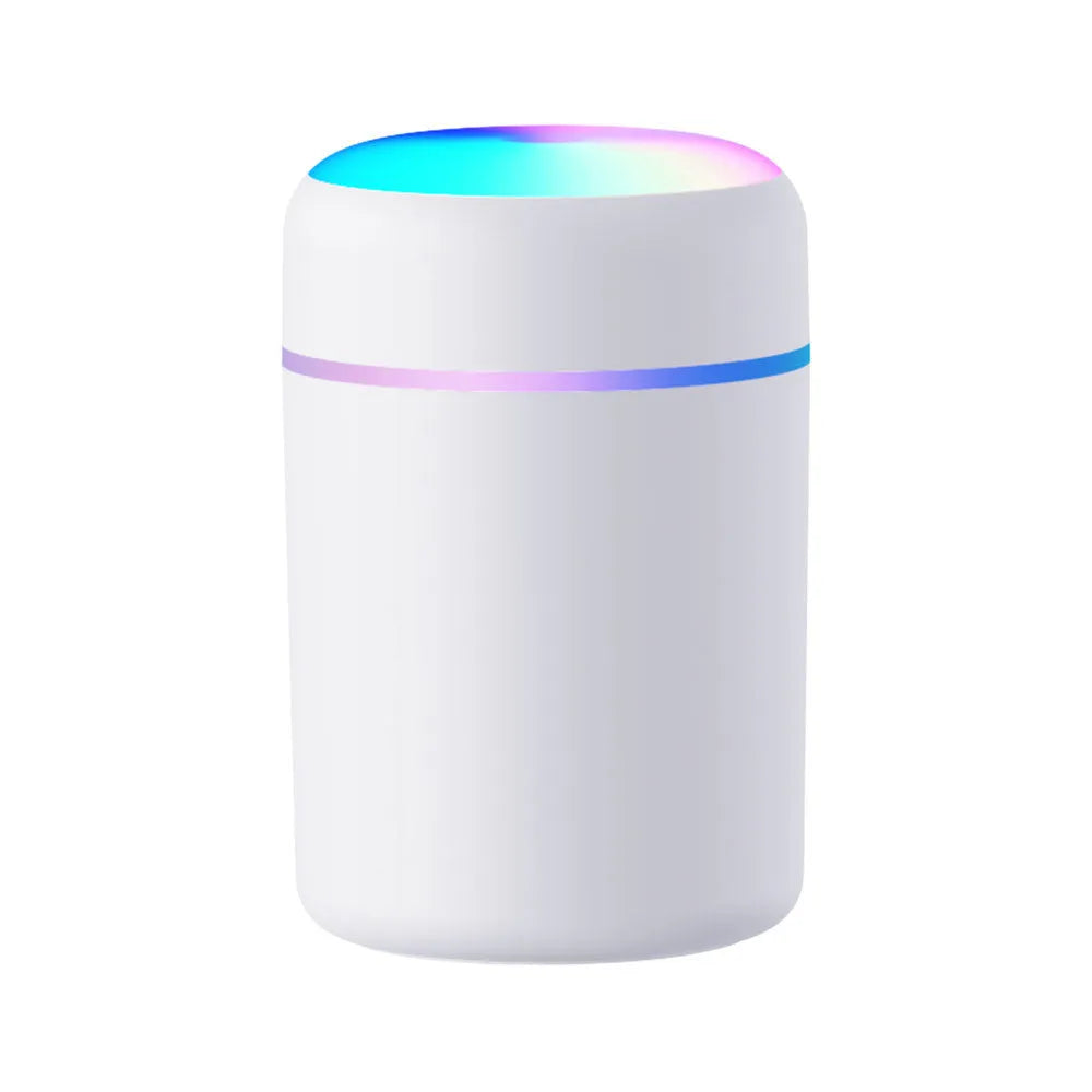 Mini horse USB humidifier aroma diffuser with transparent tank, black cover, and single fog nozzle on desk