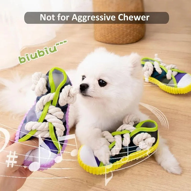 Dog toy shaped like cotton rope slippers with shoelaces, sole patterns, and built-in sound devices for playtime