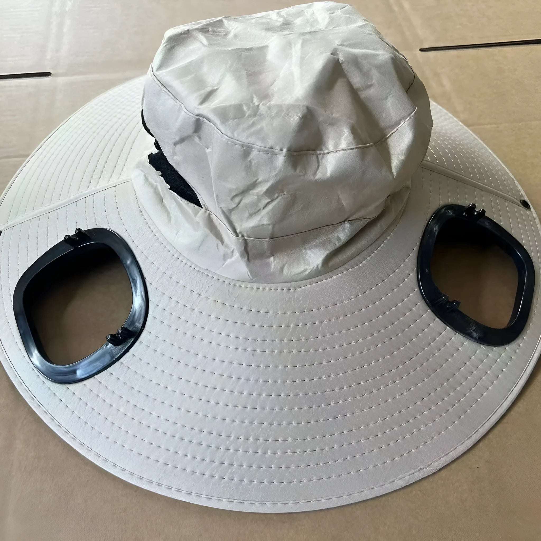 Men's grey solar fan cap with large sun-shading eave and integrated cooling fan
