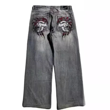 Grey washed-out men's wide-leg jeans with a straight cut on a neutral background.