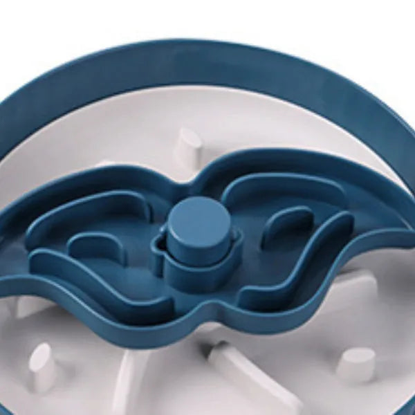 Slow feeder dog bowl with rotating game board and textured silicone licking mat insert.