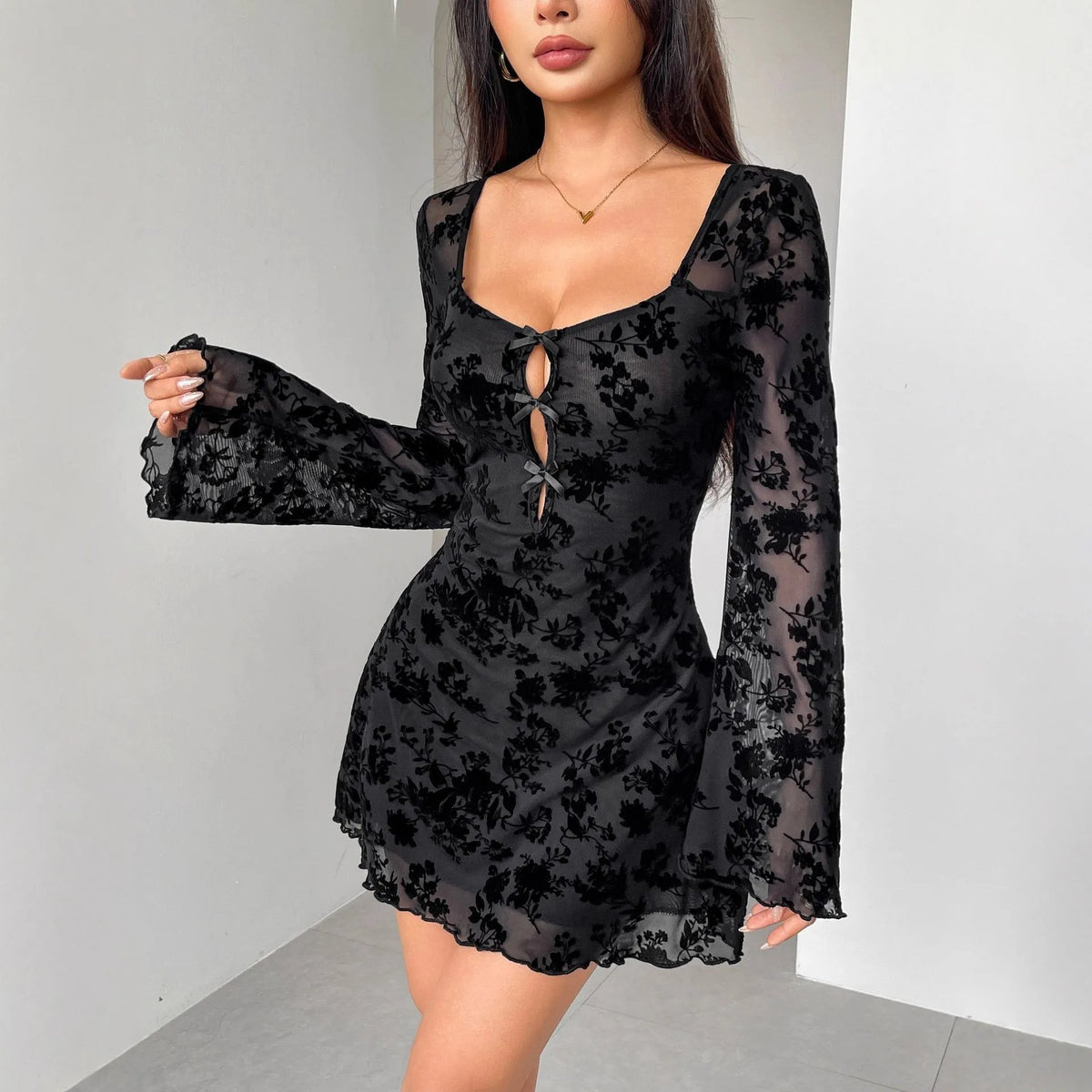 Women's flocking long sleeve floral hollow bow dress in black, square collar, bell sleeves, high-waist short hip skirt