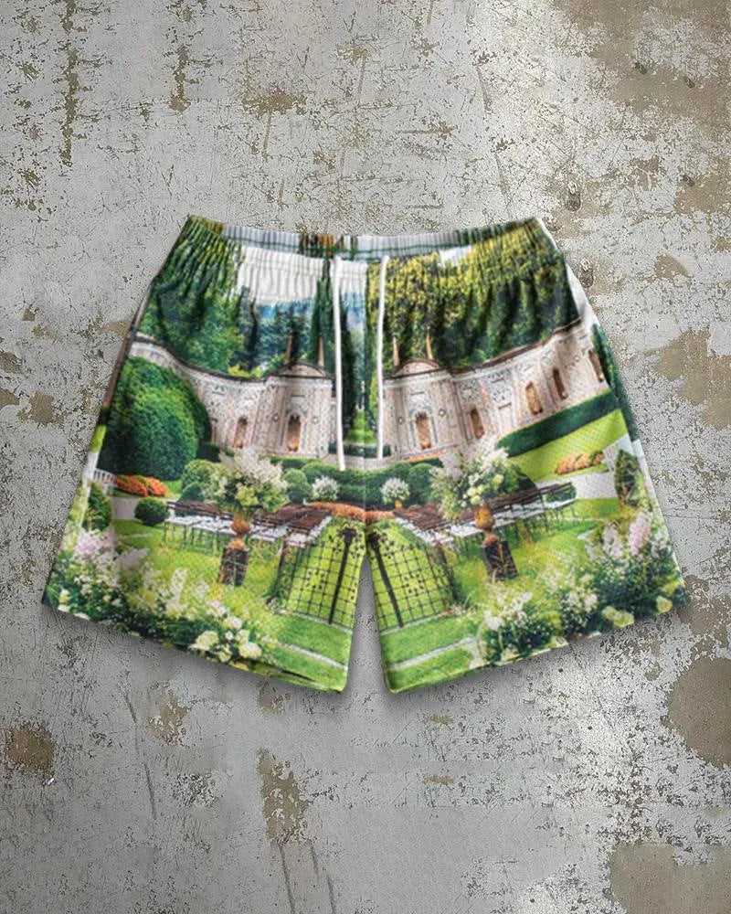 Man wearing loose-fitting digital print beach shorts made from quick-drying milk silk polyester.