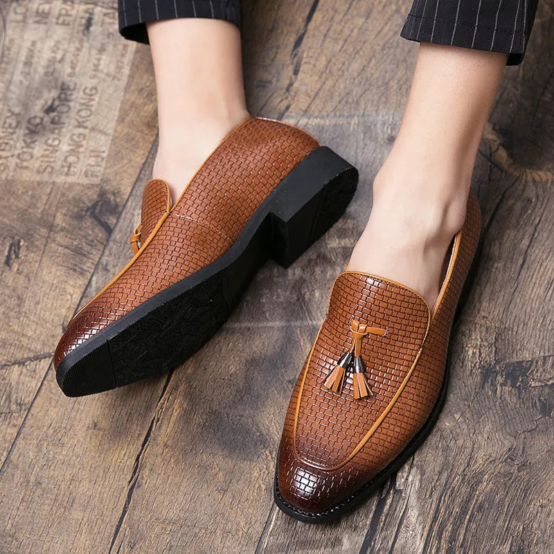 Men's black slip on loafers with pointed toe and tassel detail on PU leather upper