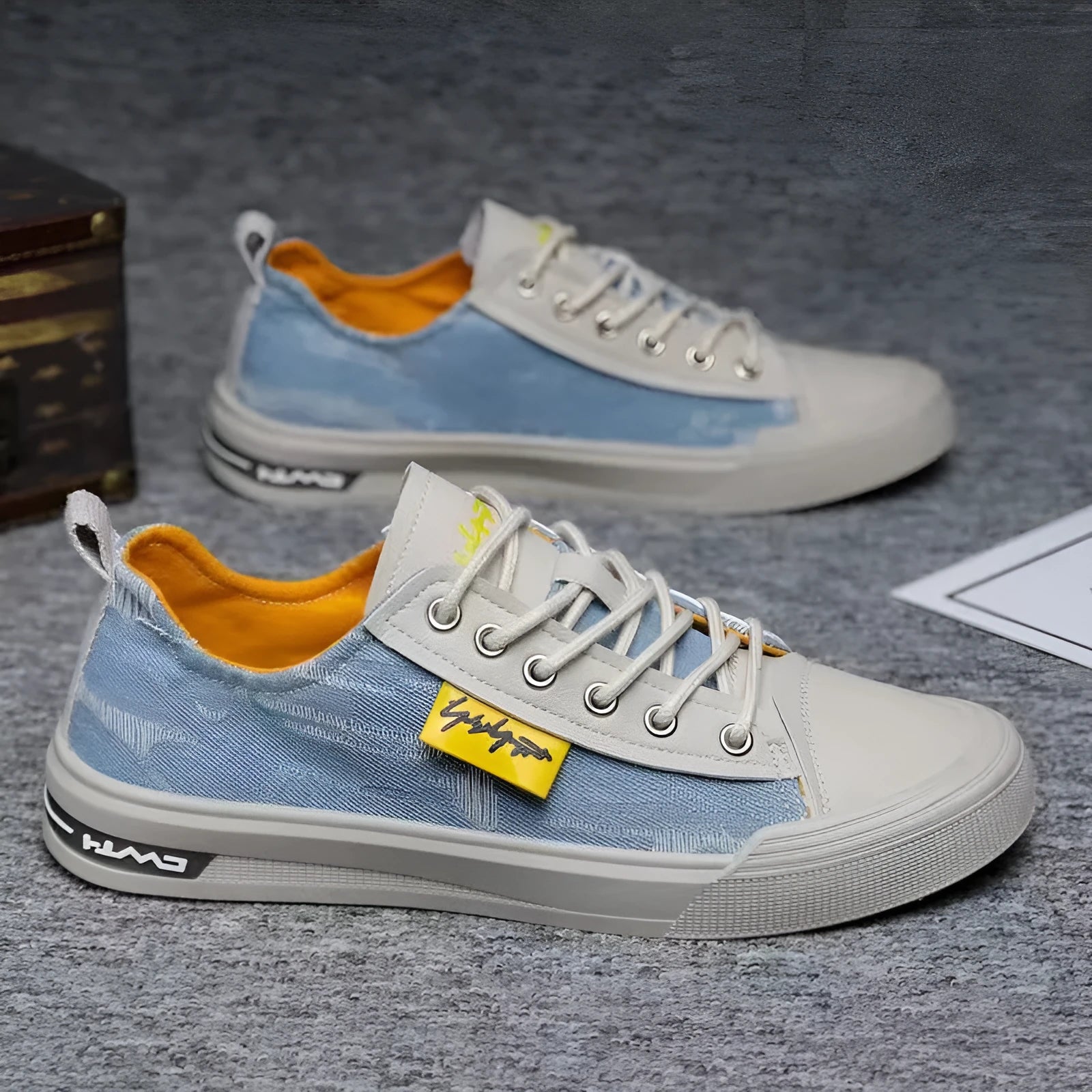 Men's casual canvas shoes in light blue with round toe, rubber sole, and lace-up closure.
