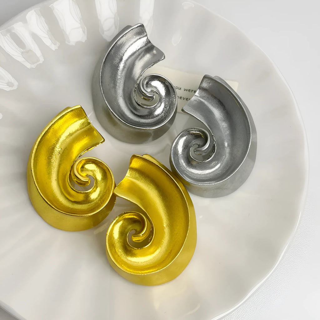 Geometric retro ear studs in alloy with electroplated gold or silver finish measuring 5cm