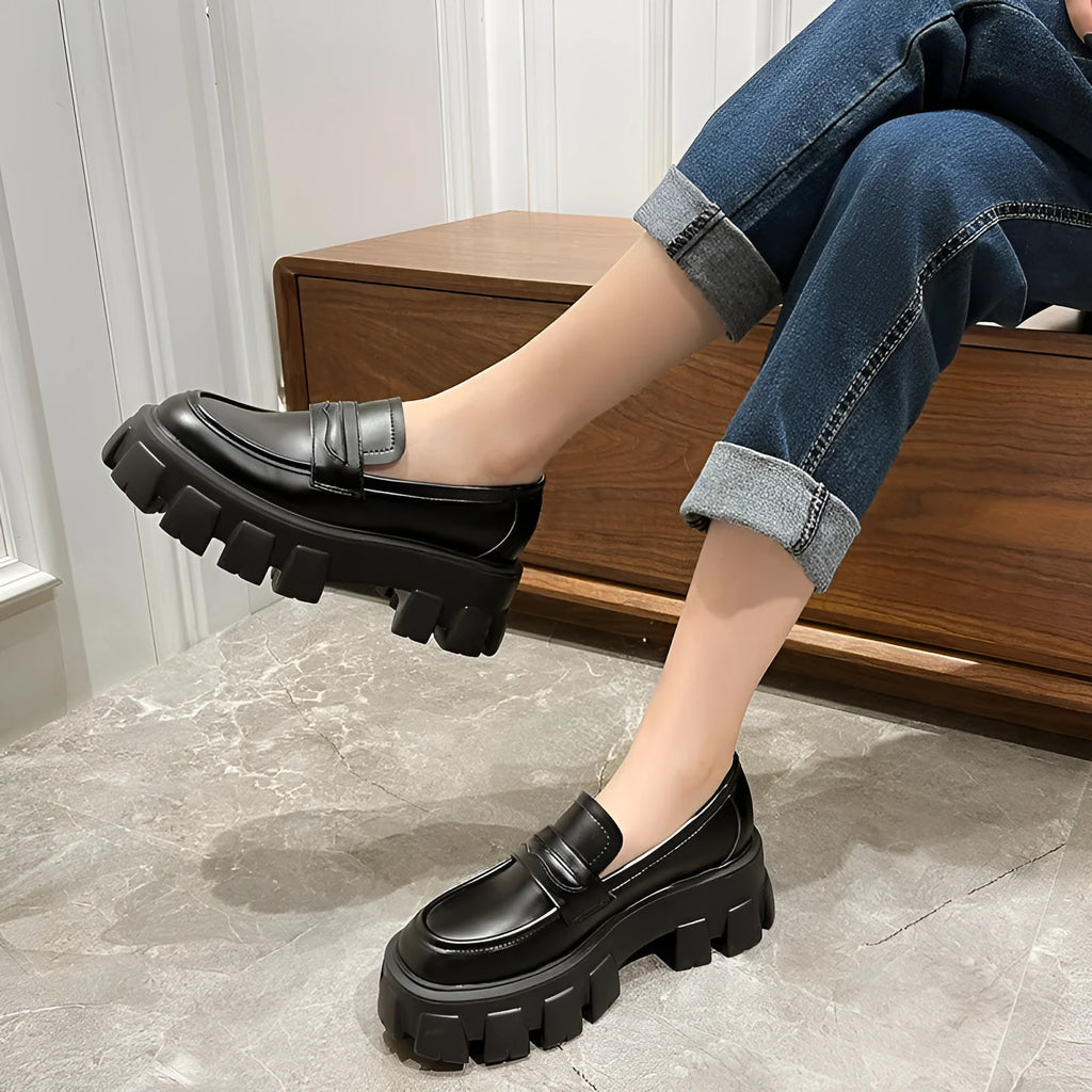 British wide-fit loafers in matte and patent leather with shallow opening and muffin heel design