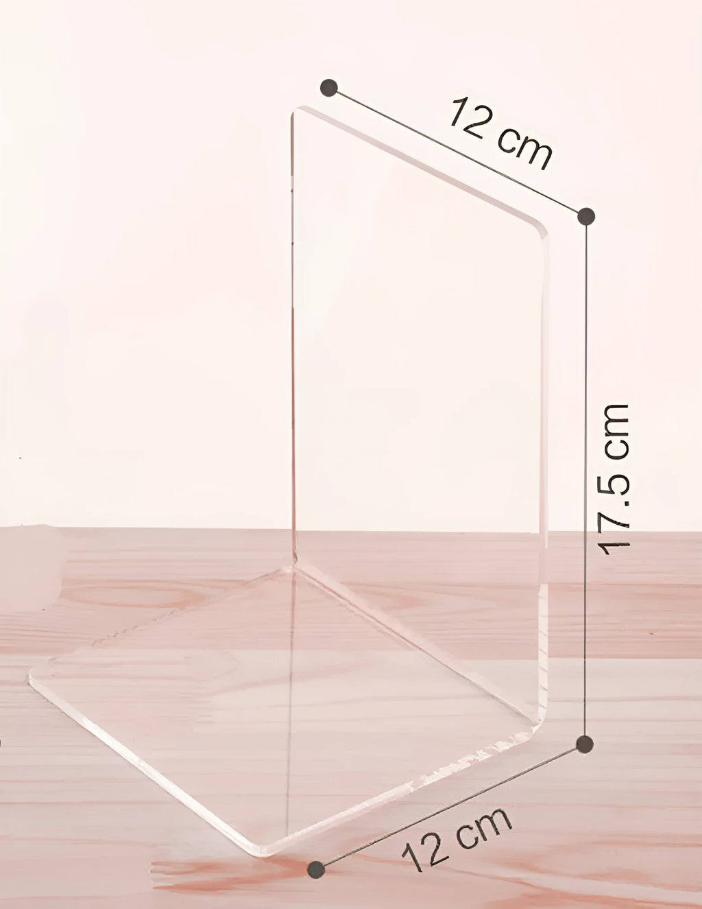 Transparent acrylic bookshelf holding two books on a desk surface
