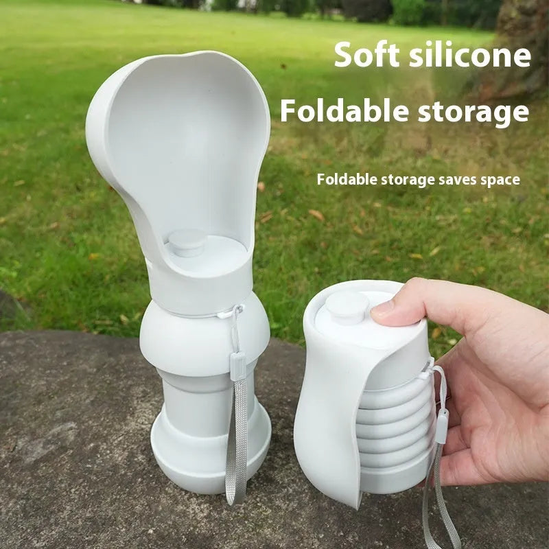 Outdoor pet folding drinking cup made from silicone, with a short and long option, on a white surface