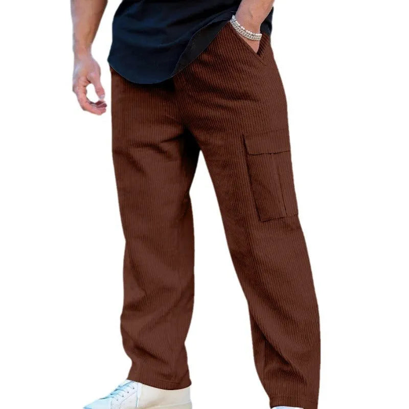 Men's loose-fitting corduroy cargo trousers in a straight-leg cut, shown in a solid colour.