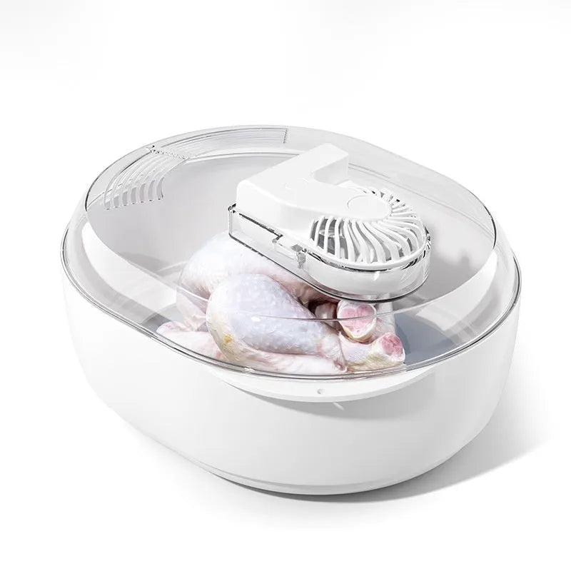 Aluminium quick defrosting plate for food on a kitchen worktop.