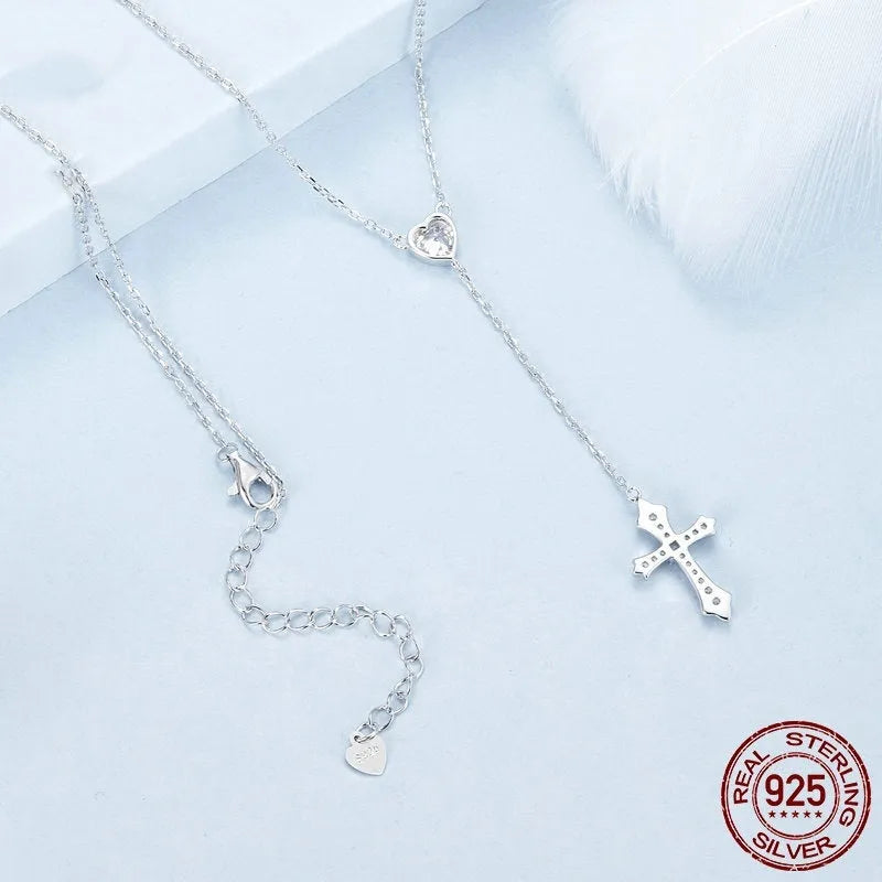 Silver love cross necklace for women with V-neck design and O-ring chain in colour BSN384