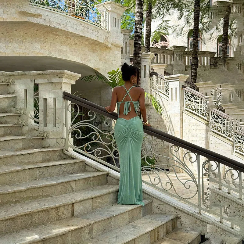 Green fishtail dress with deep V backless design and high waist