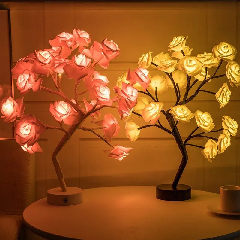 White and red rose flower LED table lamp with bonsai tree lights on a table.
