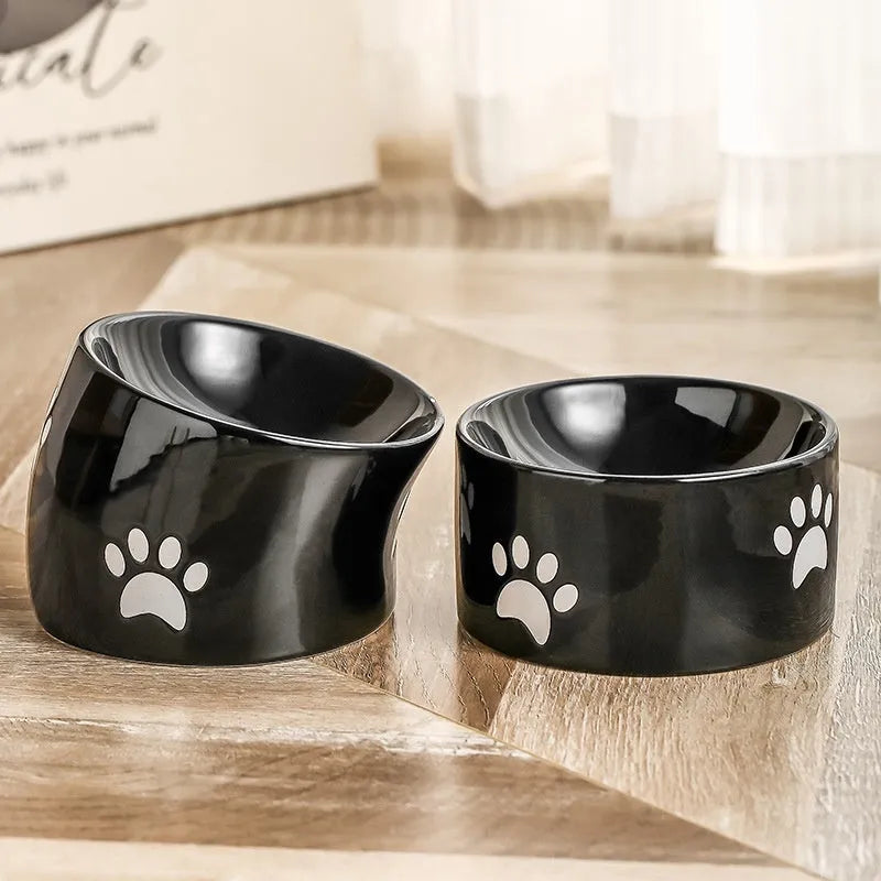Ceramic cat bowl with high foot design in cat's paw pattern available in multiple colours