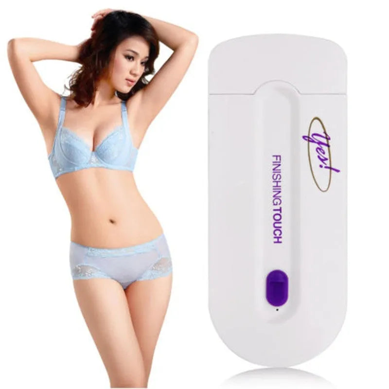 Black rechargeable electric hair remover with Sensa-Light head, trimmer head, foil head, USB cable and cleaning brush.