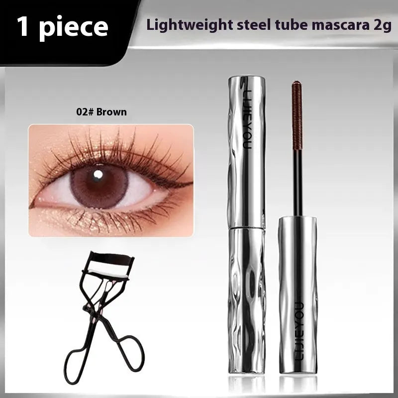 Waterproof steel tube mascara and eyelash curler in black and brown shades.