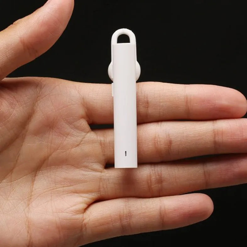 Black and white wireless Bluetooth headset showing compact 5.6cm size with V4.1 Bluetooth technology