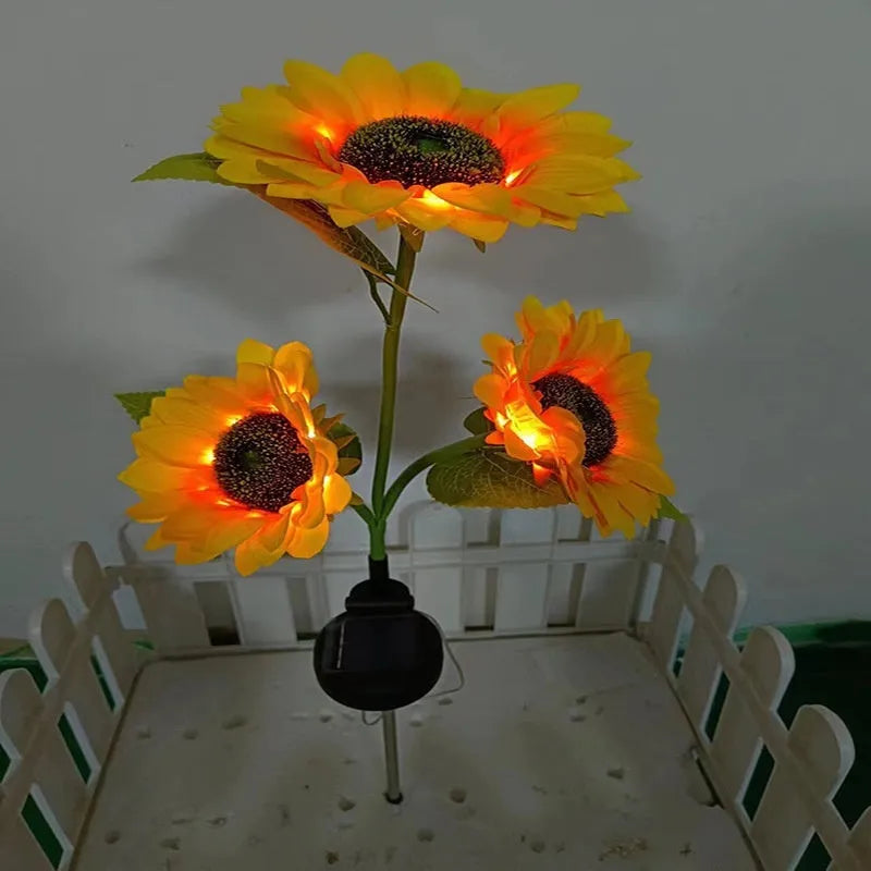 Flower-shaped solar LED ground lamp for garden lighting with colour-changing LEDs