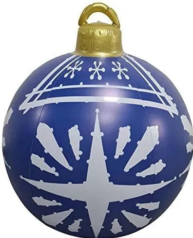 Large red and white striped inflatable Christmas ball ornament hanging on an outdoor tree