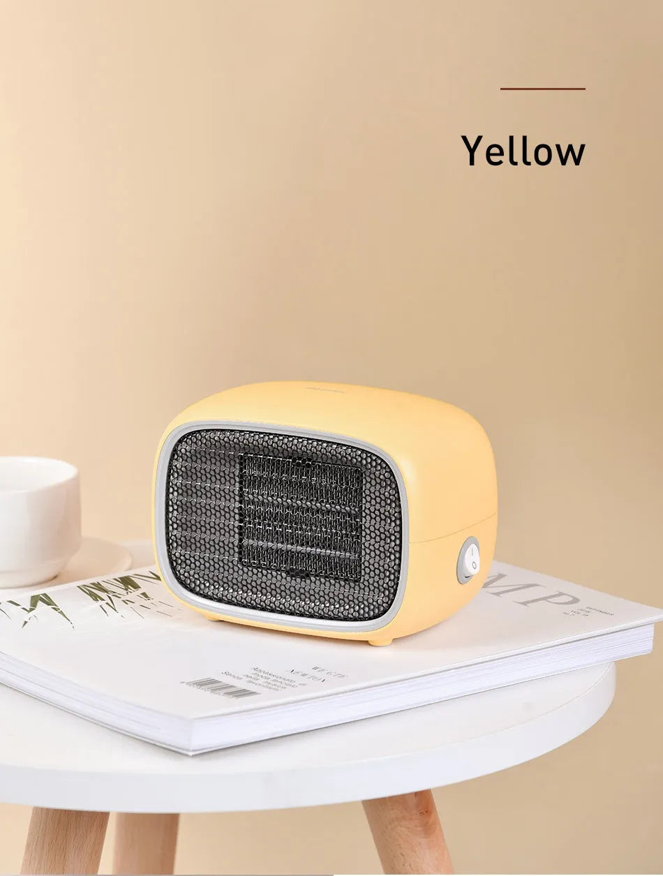 Mini ABS plastic PTC ceramic heater in green colour showing compact dimensions
