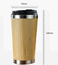 Bamboo coffee cup with thermal insulation, leak-proof lid, and anti-slip foam pad base showing 420ml capacity
