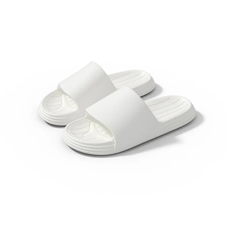 Unisex EVA injection moulded indoor slippers with floral detail, available in multiple colours