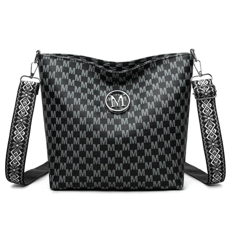 PU dumpling shape shoulder bag in black showing structured design with sandwich pocket