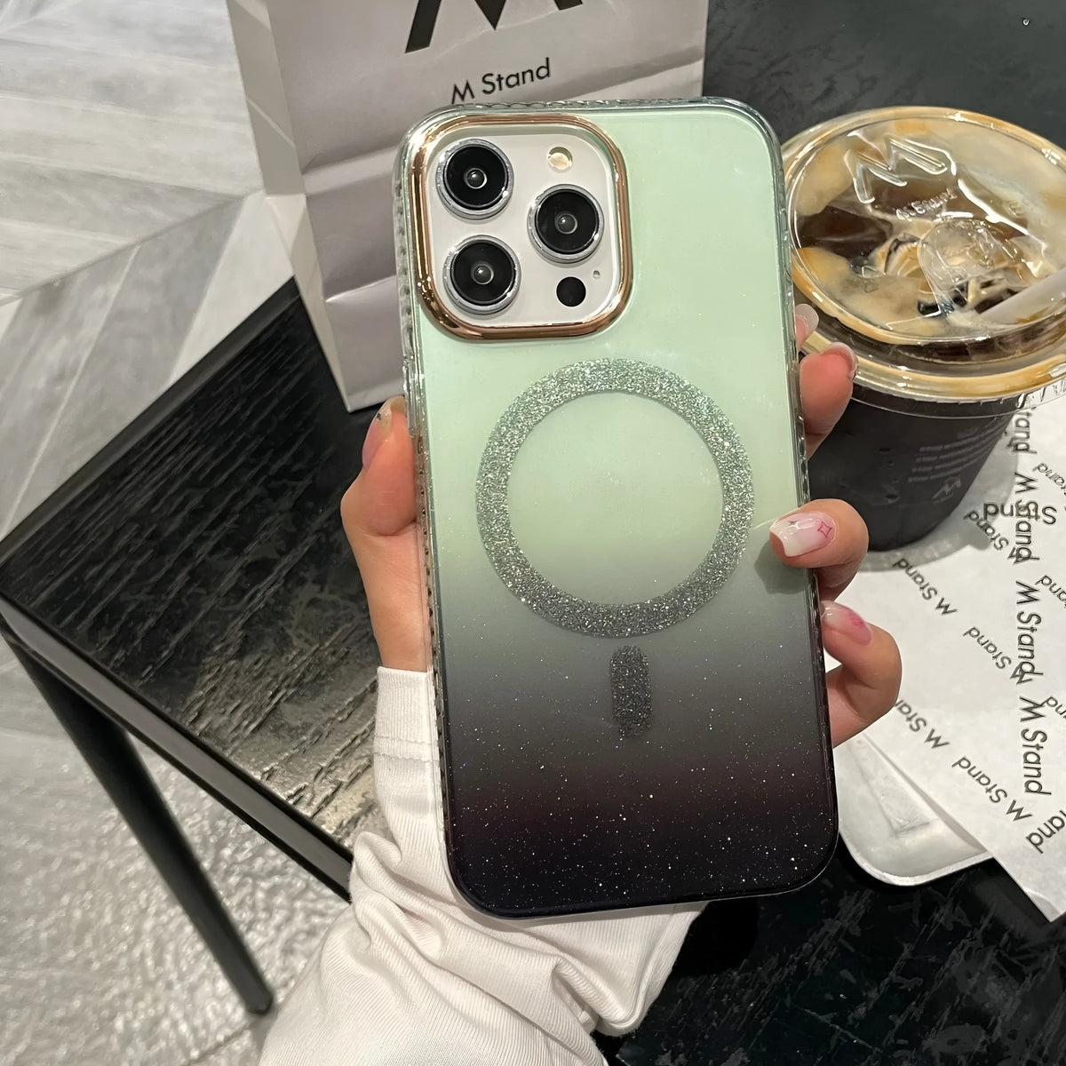 Gradient glitter gold rim magnetic suction TPU phone case for iPhone showing anti-fall design and colour options