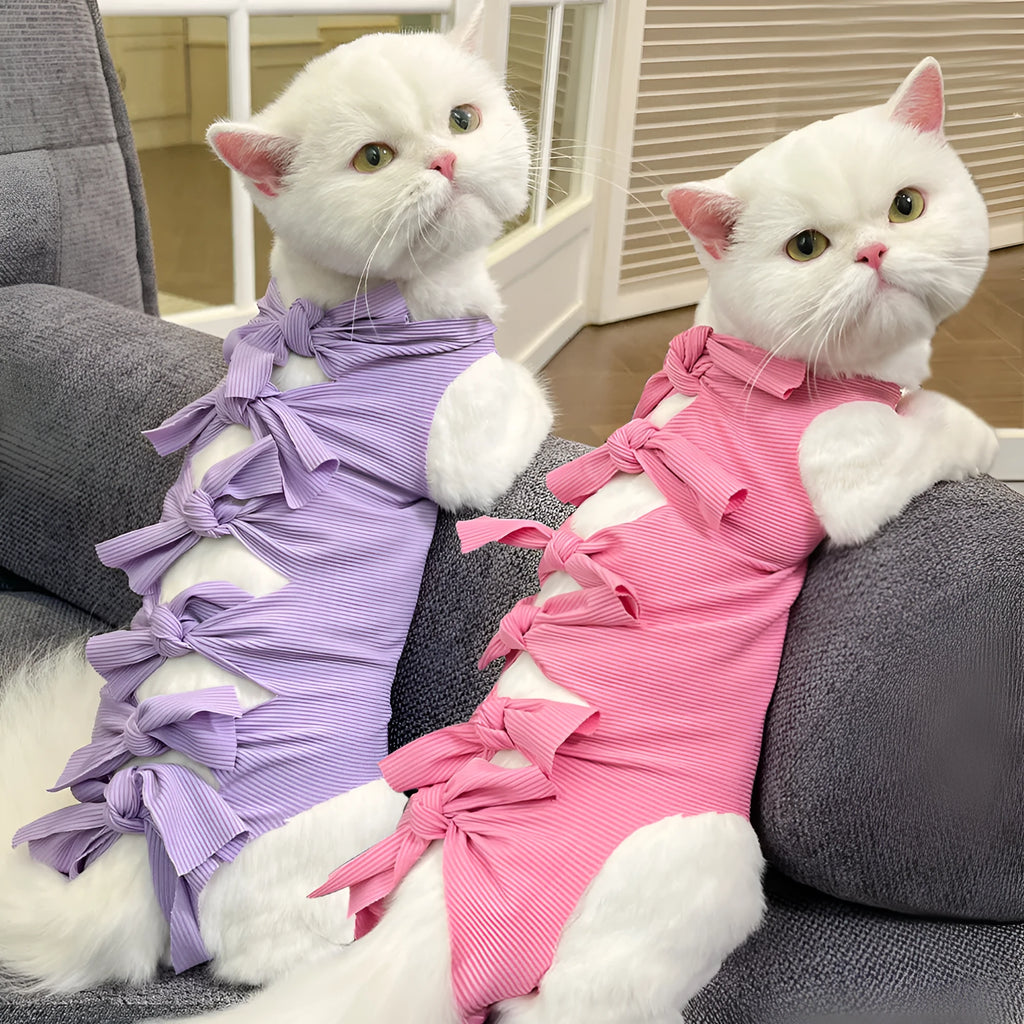 Blue lace-up polyester sterilisation clothing for a cat, shown on a size chart for S, M, and L.