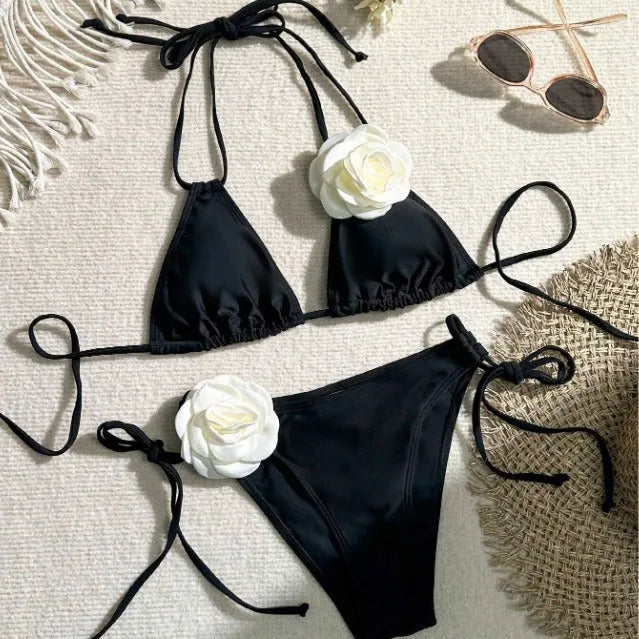 Black women's bikini swimsuit with 3D flower pattern and drawstring lace detailing on two-piece swimwear