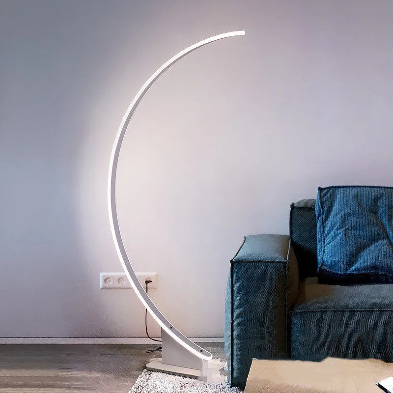 Nordic curved line floor lamp with white finish and silicone lampshade