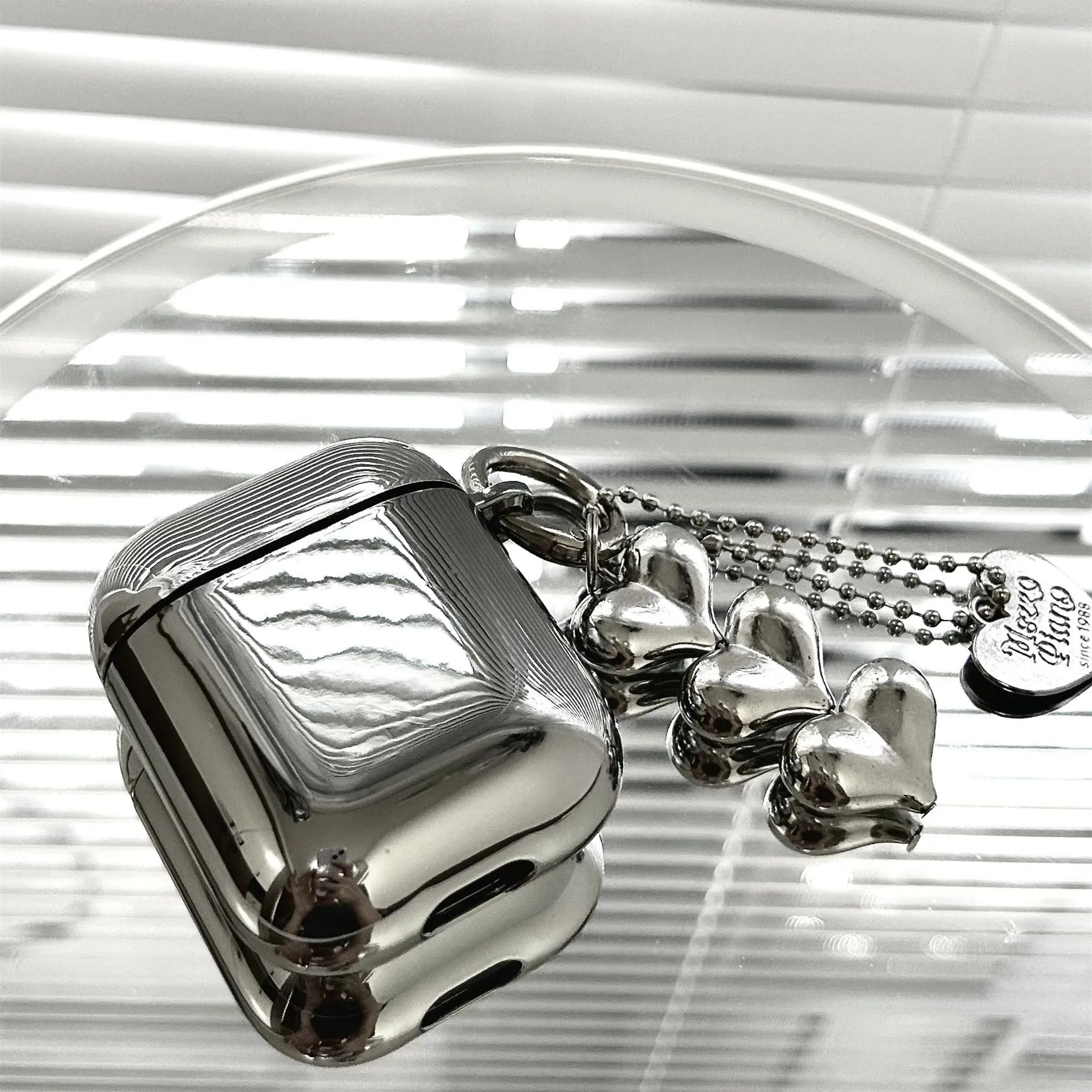 Electroplated solid colour TPU case for AirPods with attached heart pendant and bracelet chain