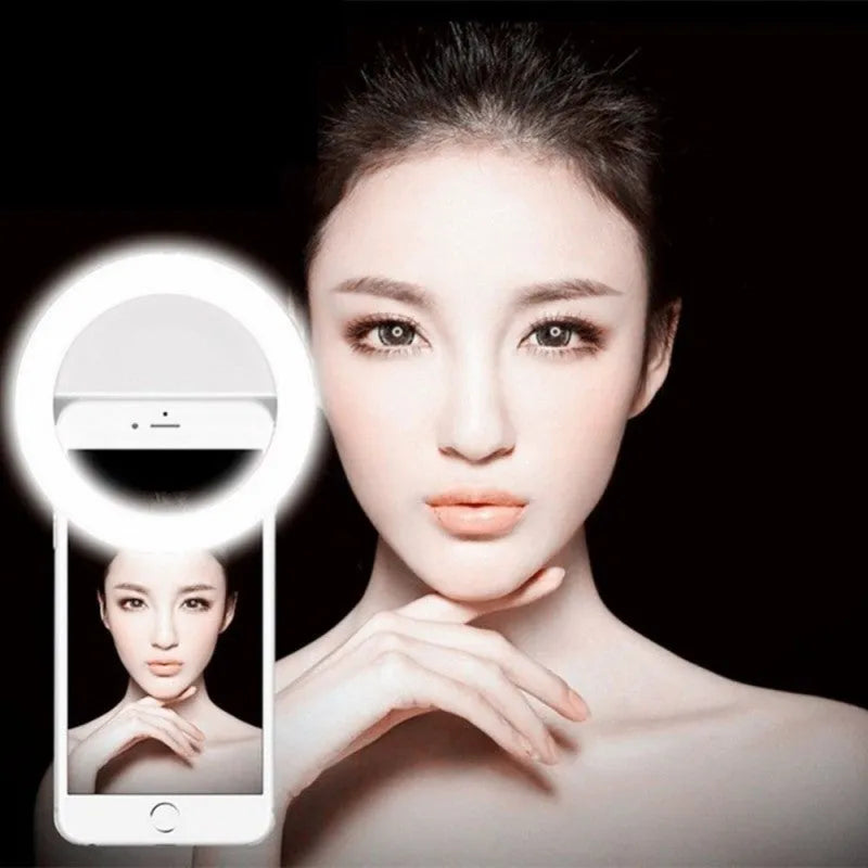 Mobile phone clip-on selfie ring light with LED bulbs in various colours