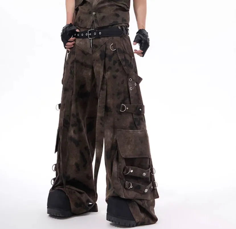 Men's denim vest and camouflage trousers set shown on a model, featuring a semi-high collar and button front.