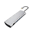 Grey aluminium USB C docking station with HDMI, VGA, and USB ports.