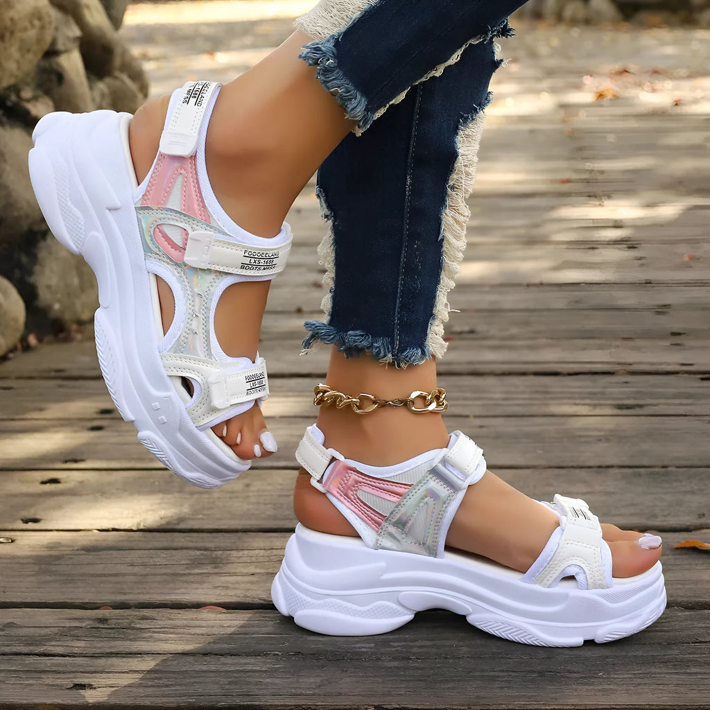 Women's white Roman platform sports sandals with strapped PU upper on a rubber sole.