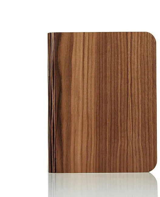 Solid wood book light in three sizes with USB cable showing white and warm white light options