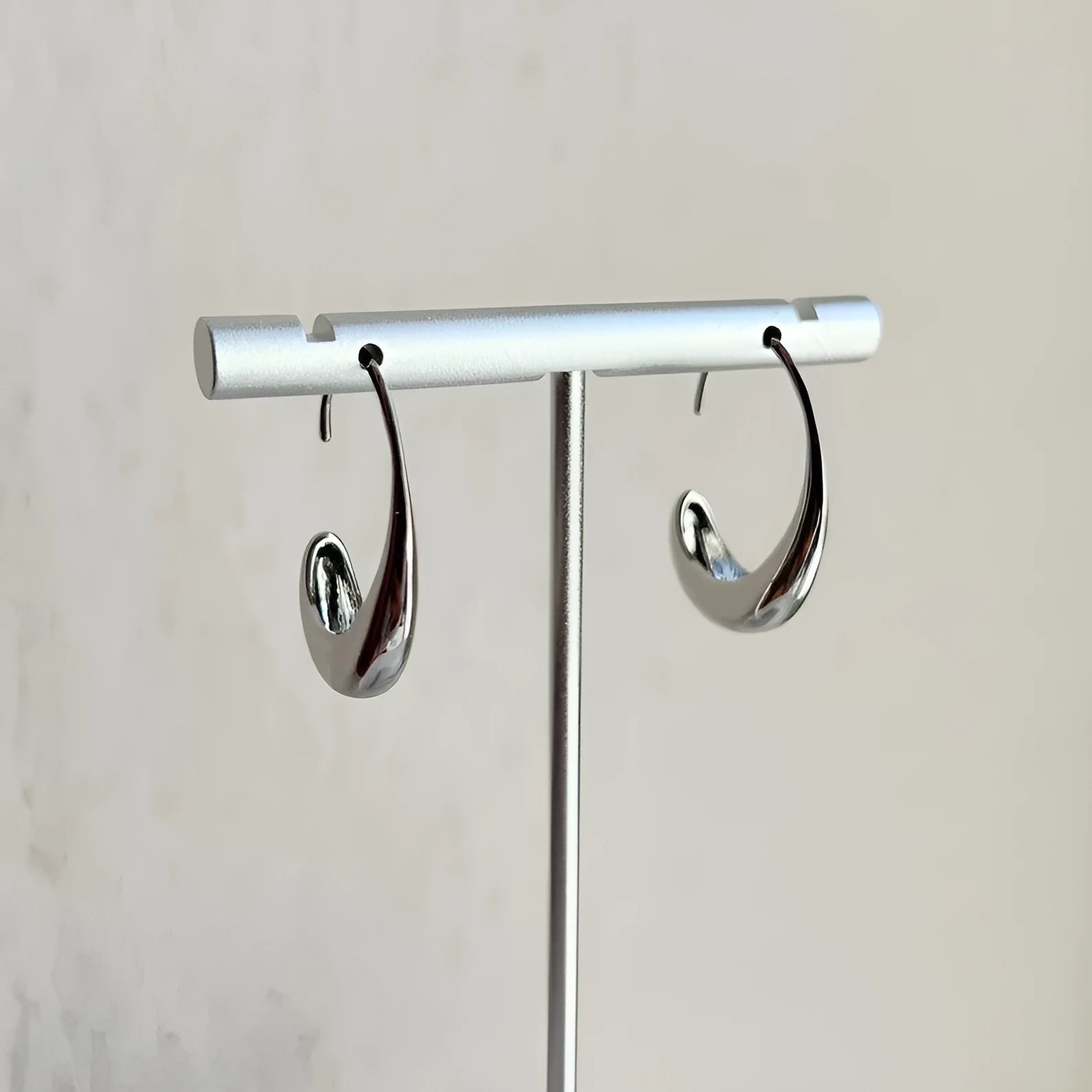 Gold and silver snake design alloy earrings with electroplated finish