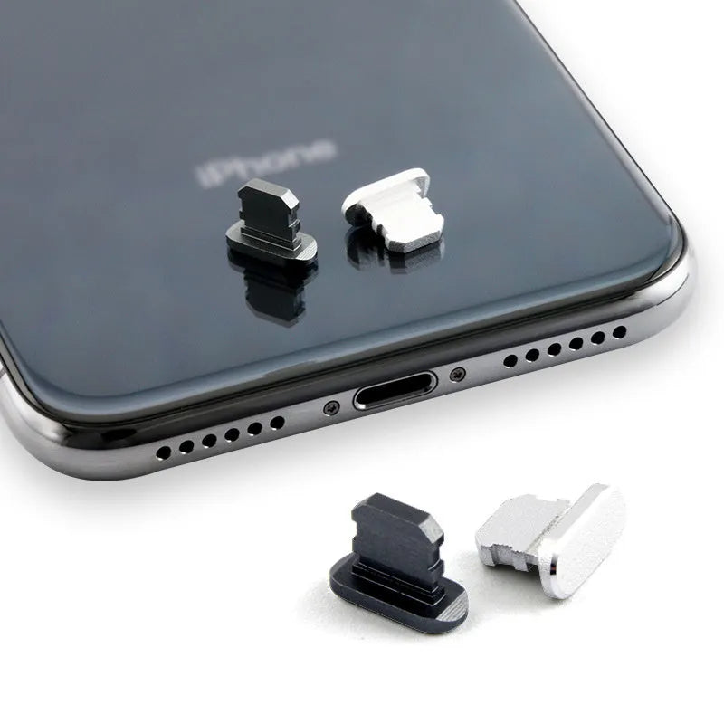 Aluminium alloy charging port dust plug for iPhone in various colours including gold, black, and rose gold.