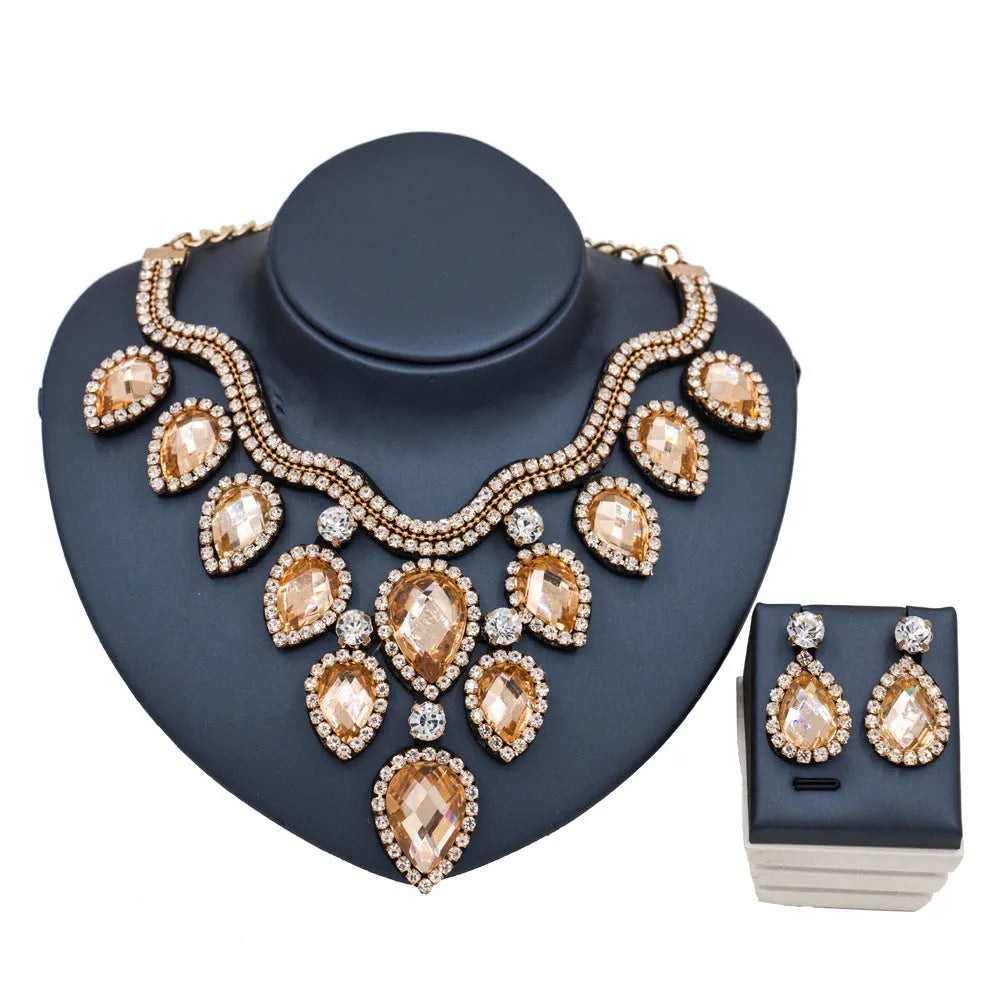 Colourful exaggerated bride necklace and earring set with gold accents for wedding