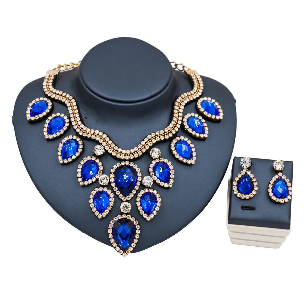 Colourful exaggerated bride necklace and earring set with gold accents for wedding
