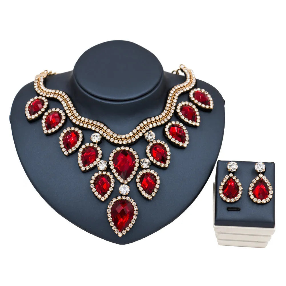 Colourful exaggerated bride necklace and earring set with gold accents for wedding