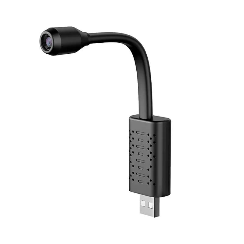 Black V380 wireless USB camera showing compact size and USB port.