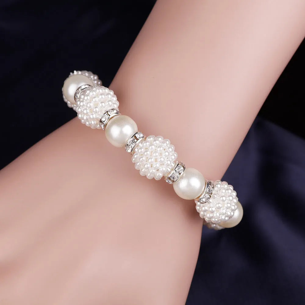Bridal Danbi pearl necklace and earrings three piece matching jewellery set on display