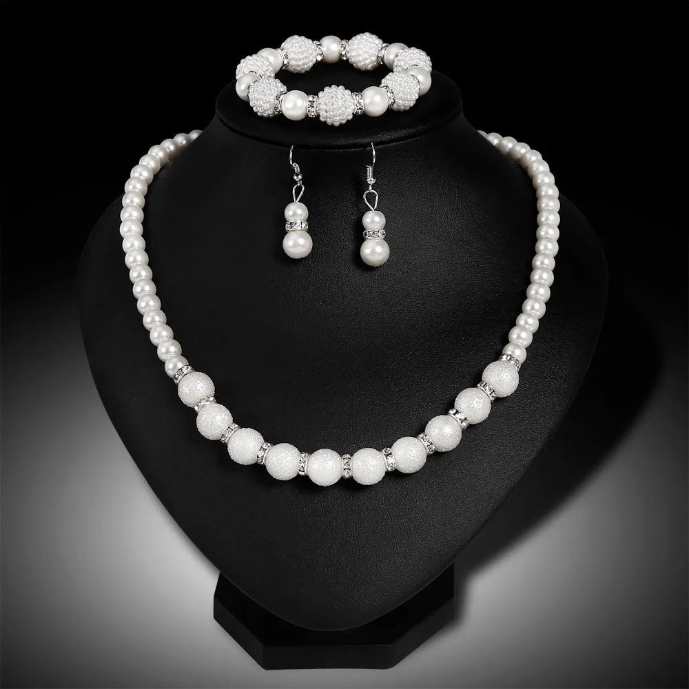 Bridal Danbi pearl necklace and earrings three piece matching jewellery set on display